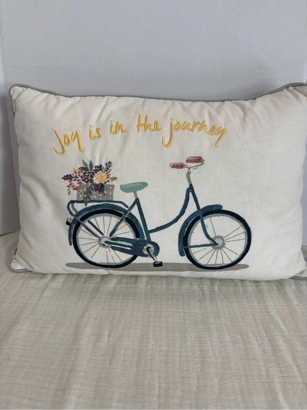 Decorative Cream Pillow with Blue Bicycle and Yellow Script